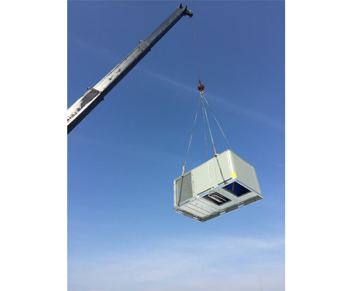 crane carrying an hvac