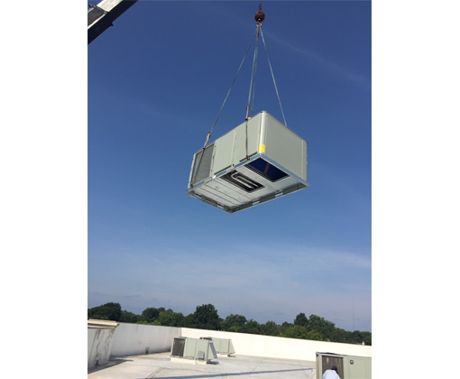 crane carrying an hvac